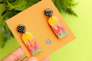 colourful earrings with polka dot studs